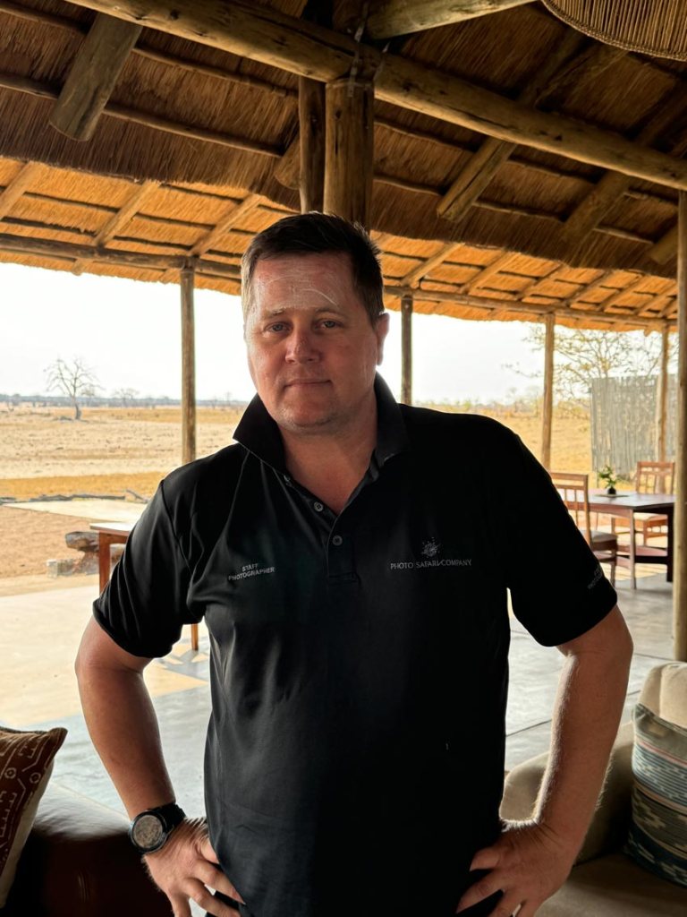 Herd of water buffalo standing in a river