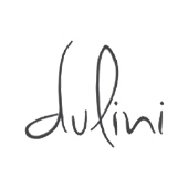 Elegant cursive writing of the word "dulini" in a soft gray color, perfect for home decor or branding.